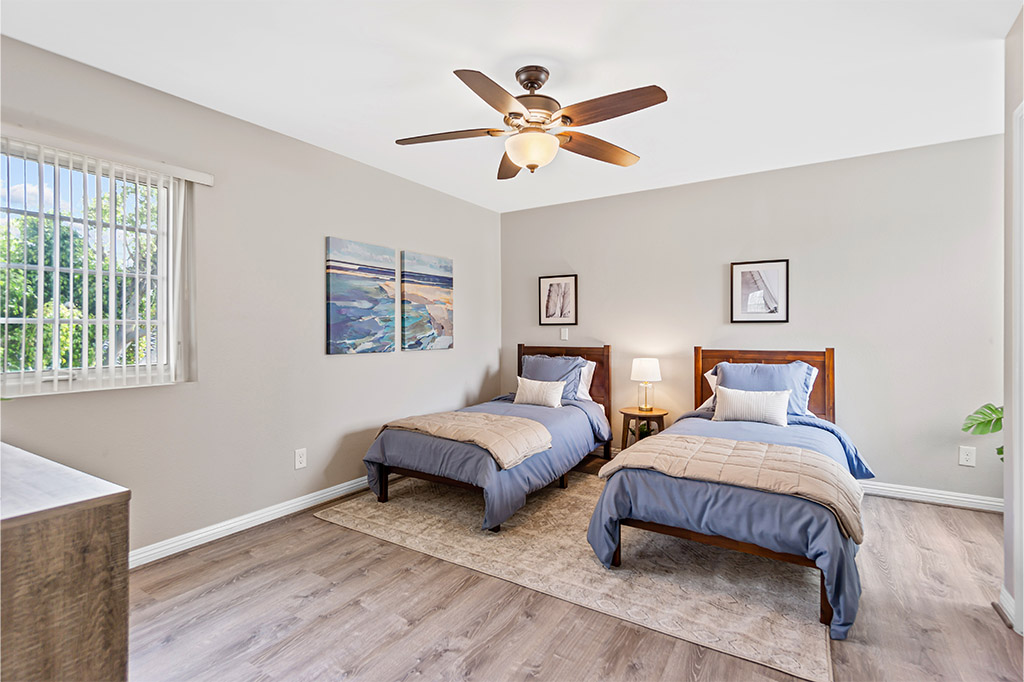 real-photo-of-dark-living-room-interior-with-glass-lamp-floral-1024x682_0003_12501-S-Minter-St-13-of-19