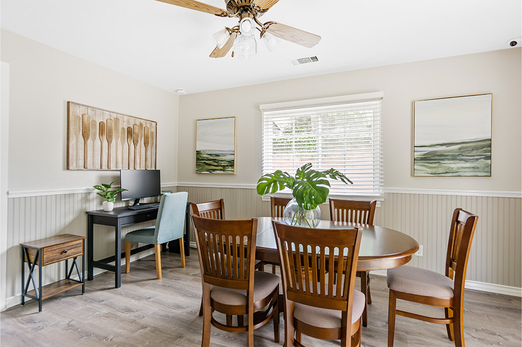 real-photo-of-dark-living-room-interior-with-glass-lamp-floral-1024x682_0004_12501-S-Minter-St-7-of-19